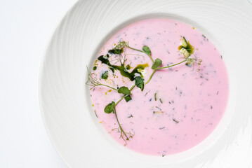 cold beetroot soup on the white background