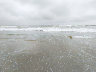 Wave of the sea on the sand beach, summer sand beach background