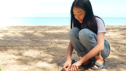 Teenager of girl playing sand on the beach together having fun enjoy freedom on summer vacation...