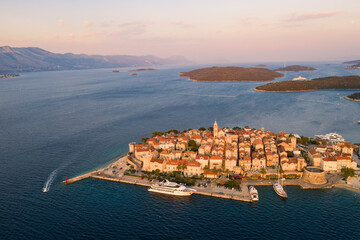 Sunset over the Korucla medieval old town by the Adriatic sea in Croatia