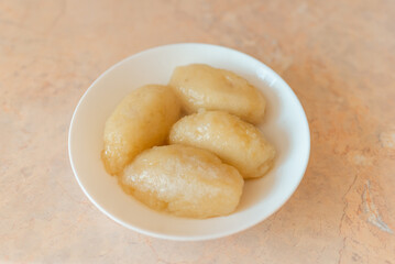 Traditional Lithuanian dish meal cuisine, stuffed meat potato dumpling,most popular Lithuanian national dish on a plate.