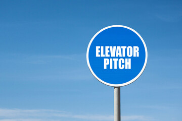 'Elevator pitch' sign in round blue frame. Clear sky is on background