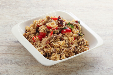 Arabic cous cous with meat and tomato
