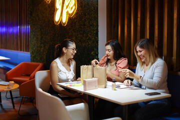 Entrepeneur Women Packing Products of Business Smiling