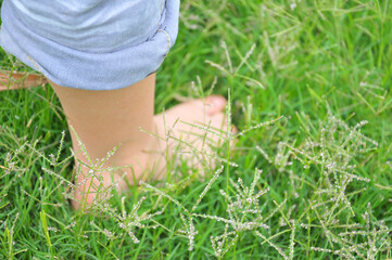 feet in grass