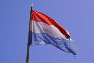Netherlands flag National dutch  holland red blue white colors in sky