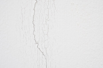 cracked concrete on white wall texture background
