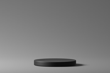 3d black cylinder podium pedestal product display on black background. 3d render illustration.