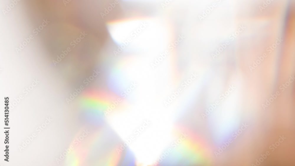 Wall mural optical game of faces inside a diamond. loop. the light passes through the facets of a slowly rotati
