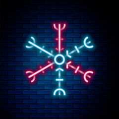 Glowing neon line Snowflake icon isolated on brick wall background. Colorful outline concept. Vector