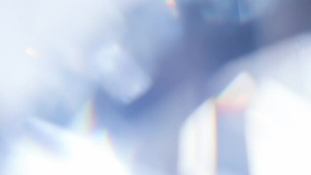 Diamond Glare Mystically Sparkles. Loop. The light passes through the facets of a slowly rotating diamond and creates repetitive sparkling highlights and rainbow colors