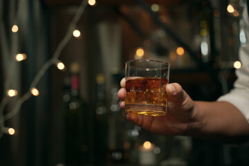 Businessmen in suits drinking whiskey