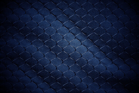 metal wire mesh on dark blue abstract background