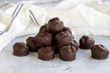 Hazelnut chocolate. Special hazelnut chocolate on a white background. close up
