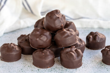 Hazelnut chocolate. Special hazelnut chocolate on a white background. close up