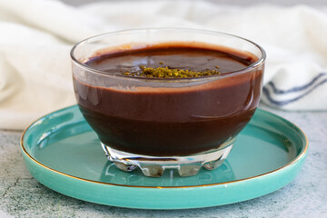 Supangle dessert or sup dessert on stone background. Chocolate pudding with cream filling in the middle. World cuisine delicacies. close up