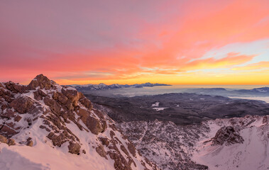 Vivid sunrise in the mountains. A red morning in the Julian Alps.