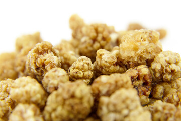 Dried mulberry on white background. Dry sweet berries morus alba