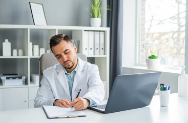 Doctor Works in the Medical Office. Workplace of a Professional Therapist in a Hospital or Clinic. The Concept of Healthcare and Medicine.