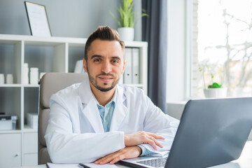 Doctor Works in the Medical Office. Workplace of a Professional Therapist in a Hospital or Clinic. The Concept of Healthcare and Medicine.