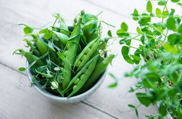 Bowl with sweet pea pods