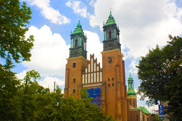 Fototapeta na wymiar Archbishop's Basilica of St. Peter and Paul on the Tumski Island in Poznan, Poland