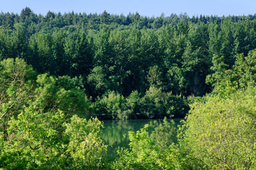 Obraz premium Hills and Seine river near Seine-port village in Ile-de France region