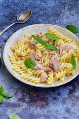  Italian home made   fusilli pasta  with  Tuna  fish, parmesan cheese and black pepper .