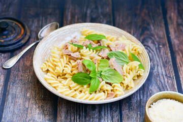  Italian home made   fusilli pasta  with  Tuna  fish, parmesan cheese and black pepper .