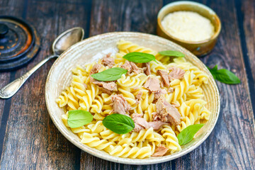  Italian home made   fusilli pasta  with  Tuna  fish, parmesan cheese and black pepper .
