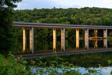 Concrete bridge spanning over “Seilersee“ in Iserlohn Sauerland Germany. Recreation area with...