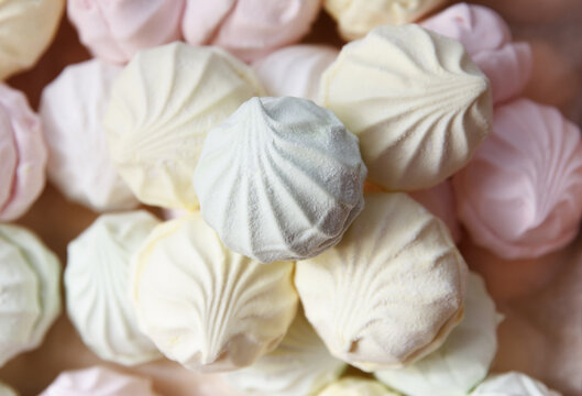 Testy multicolored air marshmallow according to a classic recipe at a confectionery factory, lies for sale to customers