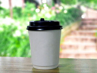 coffee paper cup   in front of Arabica coffee shop, is a famous and popular for tourist