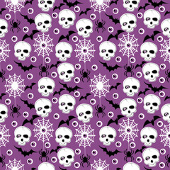 seamless background with skulls and cobwebs for halloween