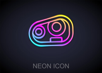 Glowing neon line Car headlight icon isolated on black background. Vector