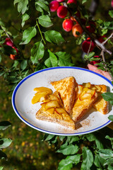 Fried toast with sweet apples and peaches