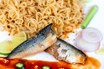 Boiled ramen with canned fish in tomato sauce
