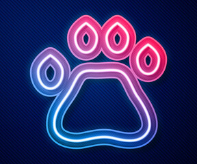 Glowing neon line Bear paw footprint icon isolated on blue background. Vector
