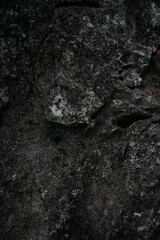 Top view of dark stone or rock texture background. high resolution wall design texture