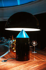 Stylish black table lamp in the interior of the restaurant