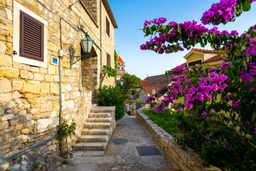 Obraz na płótnie Canvas charming cobblestone street in old town of Omis in Dalmatia in Croatia