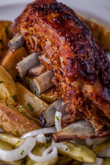 Pork ribs in honey mustard with homemade potatoes
