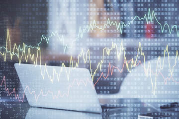 Forex market chart hologram and personal computer background. Double exposure. Concept of investment.
