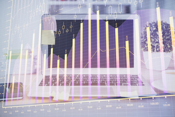 Forex market chart hologram and personal computer background. Double exposure. Concept of investment.