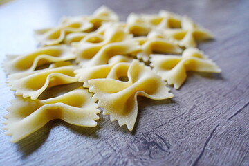Almaty, Kazakhstan - 03.30.2022 : Dry pasta is laid out on the kitchen table.