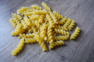 Almaty, Kazakhstan - 03.30.2022 : Dry pasta is laid out on the kitchen table.