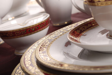 Luxury china dinnerware. Elegant golden design porcelain dishes.