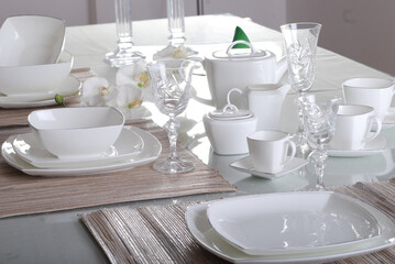 Fototapeta na wymiar Luxury china dinnerware. Elegant golden design porcelain dishes.