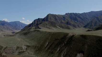 Green mountains of Altai under clear blue sky