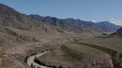 Mountains of Altai and Chuya river under clear blue sky